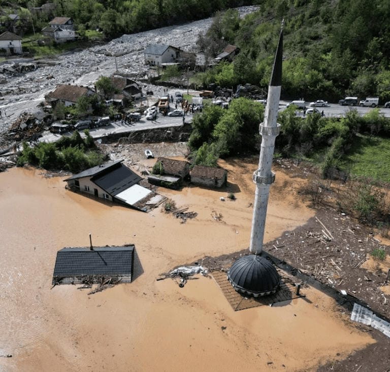 An aerial picture of a flooded village